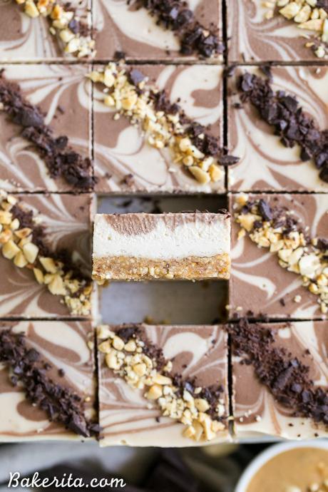 These No-Bake Chocolate Peanut Butter Cheesecake Bars have a peanut date crust and a super creamy cashew-based peanut butter filling - you'd never guess that they're vegan, gluten free, and refined sugar free!