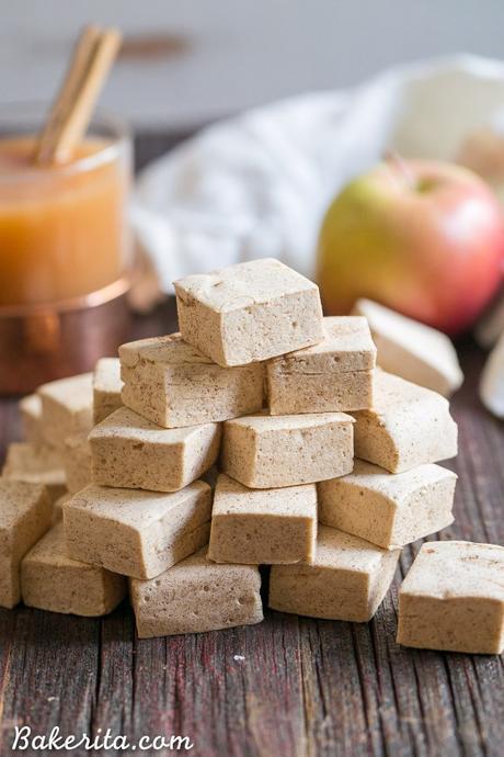 These Paleo Apple Spice Marshmallows are sweetened with maple syrup and flavored with apple juice + loads of warm spices! Homemade marshmallows are easier than you'd think, and you'll love these on their own or as the perfect apple cider addition.