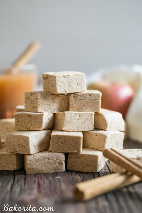 These Paleo Apple Spice Marshmallows are sweetened with maple syrup and flavored with apple juice + loads of warm spices! Homemade marshmallows are easier than you'd think, and you'll love these on their own or as the perfect apple cider addition.