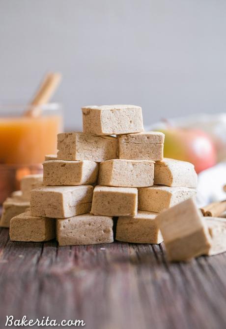 These Paleo Apple Spice Marshmallows are sweetened with maple syrup and flavored with apple juice + loads of warm spices! Homemade marshmallows are easier than you'd think, and you'll love these on their own or as the perfect apple cider addition.