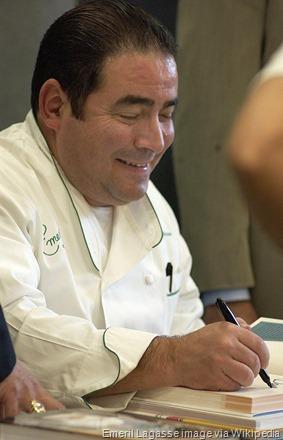 Celebrity chef and restauranteur, Emeril Lagasse signs his books and interacts with his fans during a booksigning at the Post Exchange Thursday.
