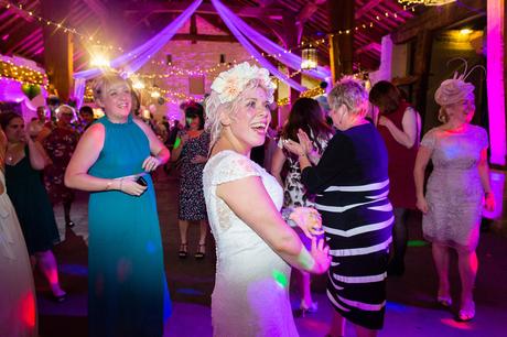 Alterntative bride with flower crown at colourful wedding at East Riddlesden Hall