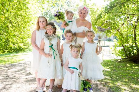 Boho Bohemian Bride and flower girls weating white dresses and flower crowns at East Riddlesden Hall Wedding 