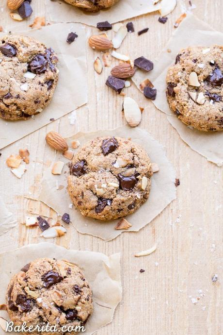 These Paleo Almond Coconut Chocolate Chunk Cookies are made with almond butter and big chocolate chunks for super gooey, decadent cookies! These gluten free and refined sugar free cookies will definitely satisfy your cookie craving.