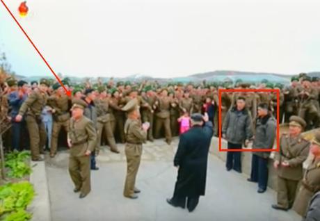 Kim Jong Un waves to KPA service members, officers and their families while departing Mahap Islet, South Hwanghae Province. Marked are the head and members of his bodyguard unit (Photo: Korean Central Television).