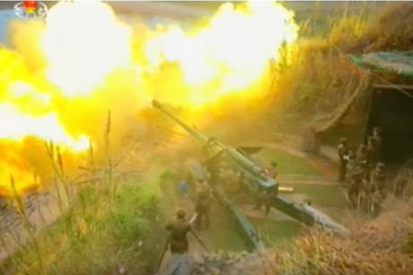 Artillery piece firing during a drill from Mahap Islet (Photo: Korean Central Television).