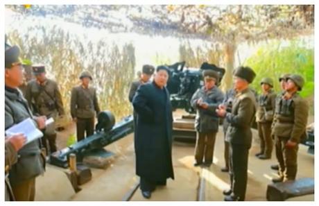 Kim Jong Un issues instructions to an artillery squad at Changjae Islet coastal defense detachment (Photo: Korean Central Television).