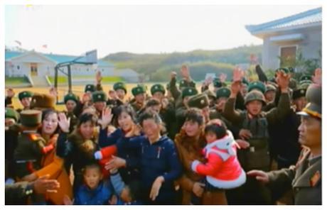 KPA service members and their families wave and shout as Kim Jong Un departs (Photo: Korean Central Television).