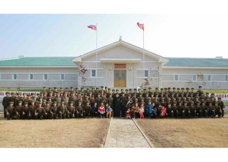 Commemorative photograph of Kim Jong Un, members of the KPA high command and service members and their families of the Changjae Islet coastal defense detachment (Photo: Korean Central Television).