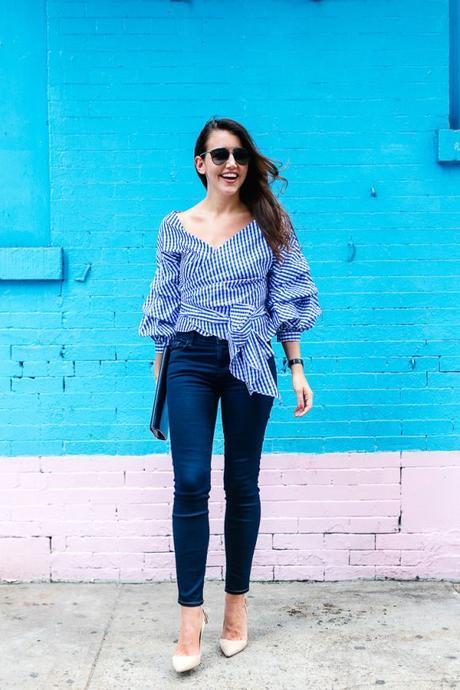 Amy Havins wears a blue and white gingham top with denim.