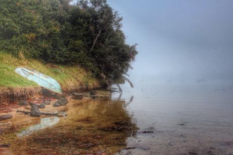 Upturned dinghy reflected in water, misty morning, Greenhithe, Auckland, NZ. Image: Su Leslie, 2016
