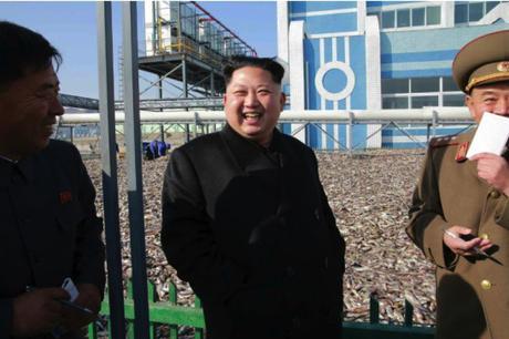 Kim Jong Un smiles during a visit to the May 27 Fishery Station of the KPA.  Also in attendance, right, is 1st Vice Minister of the People's Armed Forces Col. Gen. So Hong Chan (Photo: Rodong Sinmun).