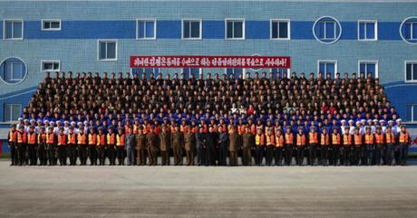 Commemorative photograph of Kim Jong Un and managers and employees of the May 27 Fishery Station which appeared on the bottom of page 3 of the November 17, 2016 edition of the WPK daily newspaper Rodong Sinmun (Photo: Rodong Sinmun).