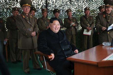 Kim Jong Un grins whilst watching a women gunners' MLRS firing contest in a photo which appeared top-center of the front page of the November 19, 2016 edition of the WPK daily organ Rodong Sinmun. Also in attendance is Chief of the KPA General Staff VMar Ri Myong Su (left) and KPA General Staff Operations Bureau Col. Gen. Ri Yong Gil (right) (Photo: Rodong Sinmun).
