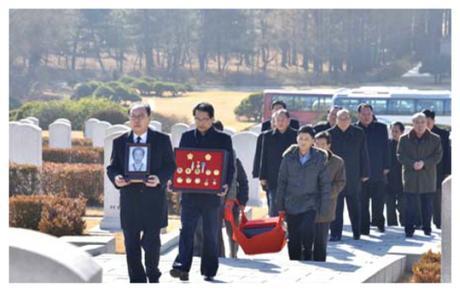Ryu Mi Yong's casket is brought to her family grave (Photo: KCNA).