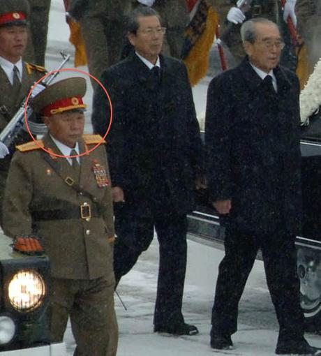 Gen. Kim Myo'ng-kuk (highlighted) clutches a radio while directing KPA officers and service members during KJI's funeral cortege on December 28, 2011 (Photo: NKLW/KCNA)