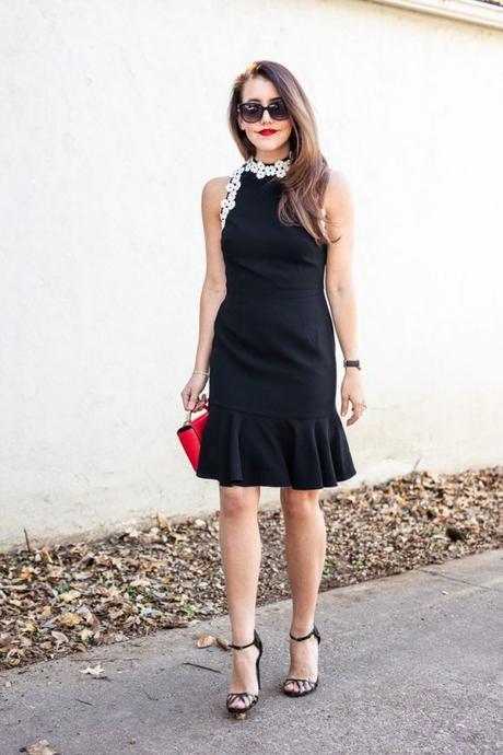 Amy Havins wears a black and white Shoshanna dress.