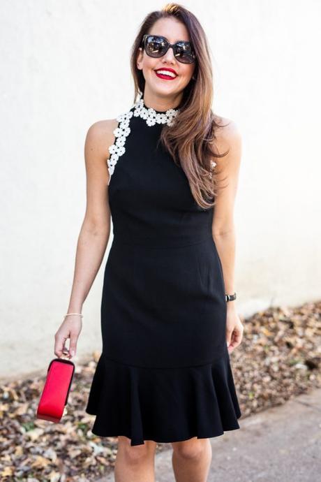 Amy Havins wears a black and white Shoshanna dress.
