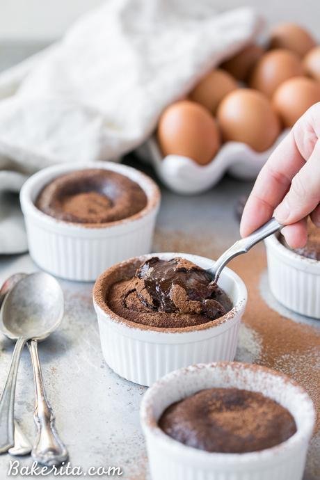 These Paleo Chocolate Melting Cakes are incredibly gooey, rich and chocolatey! This easy, five-ingredient recipe is a healthier take on Carnival's Chocolate Melting Cake. You'll love the melting, gooey center!