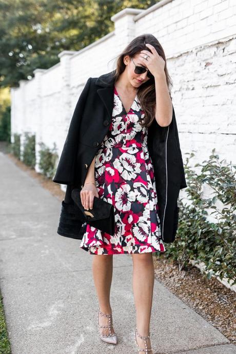 Amy Havins shares her holiday style by wearing a floral fit and flare draper james dress.