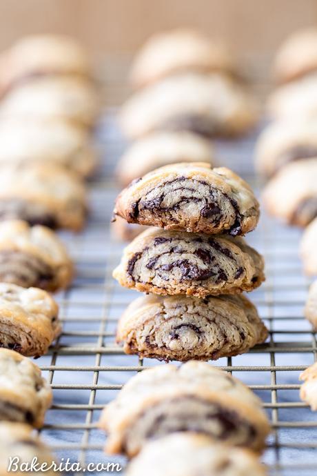 These Chocolate Rugelach are incredibly tender and flaky, thanks to the cream cheese-based dough. These refined sugar-free and gluten-free rugelach are filled with dark chocolate shavings for an irresistible holiday treat.