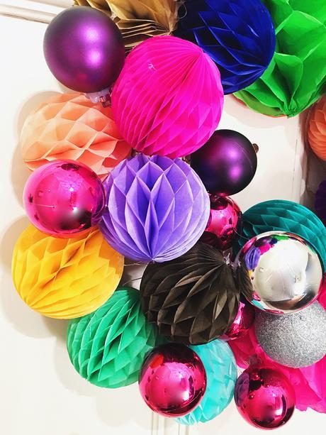 If you want a colourful Christmas, then this honeycomb pom-pom wreath might just be for you!