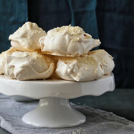 Vanilla Bean and Almond Meringues with Mixed Berry Sauce