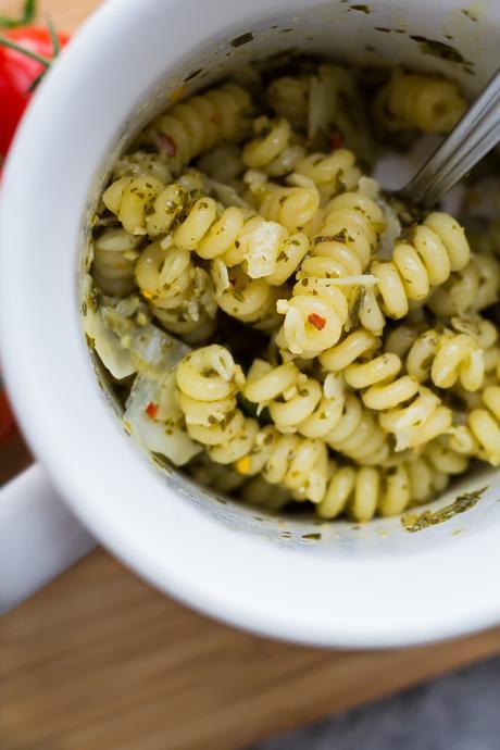 This pesto chicken mug pasta cooks up in the microwave in under 10 minutes for an easy and healthy lunch, dinner for one, or a dorm room meal.
