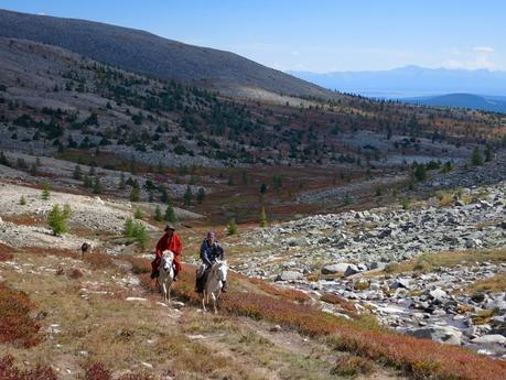 Bruno riding up the valley with Oda