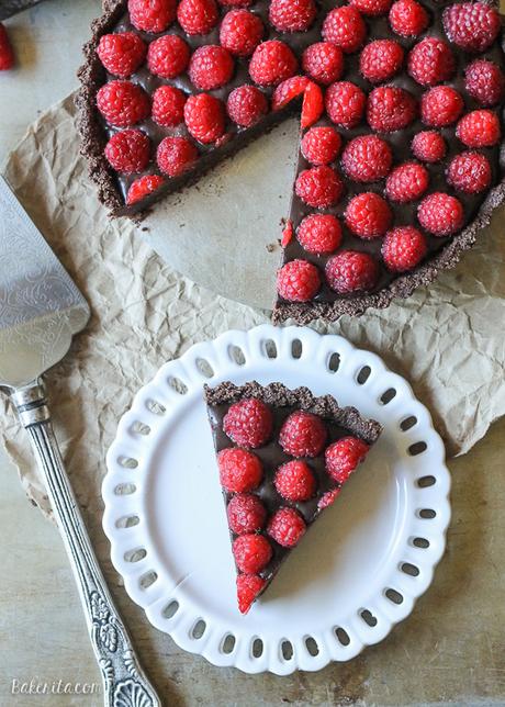 This No-Bake Raspberry Chocolate Tart comes together in just ten minutes! The no-bake chocolate crust is filled with vegan chocolate ganache and topped with fresh raspberries for a decadent, guilt-free treat.