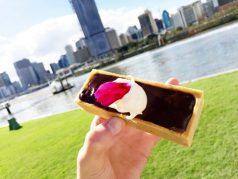 Salted caramel and hazelnut chocolate tarts with clotted Barambah Dairy cream, fresh berries from Cove at River Quay.