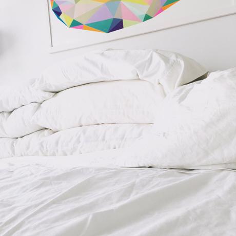 Empty Bed With White Sheets 