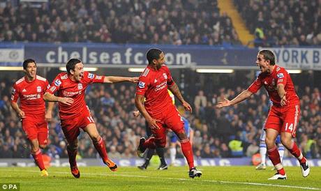 Poor form: Chelsea suffered a number of chastening defeats this season: including the 5-3 reversal to Arsenal (above) and the Carling Cup defeat to Liverpool (below)