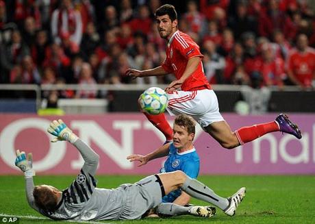 On target: Nelson Oliveira scores for Benfica in the clash with Zenit St Petersburg