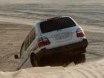 Land Cruiser descending a dune