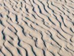 Patterns in the sand caused by the wind