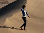 Sonya on the peak of a sand dune