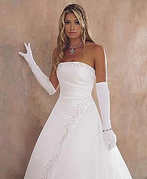 A débutante wearing a traditional white evenin...