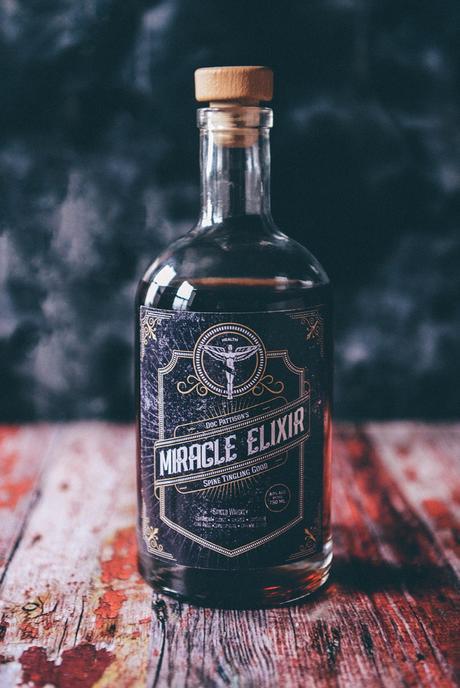 Spiced Whiskey in a Custom Labeled Bottle for the Whiskey Lover // www.WithTheGrains.com