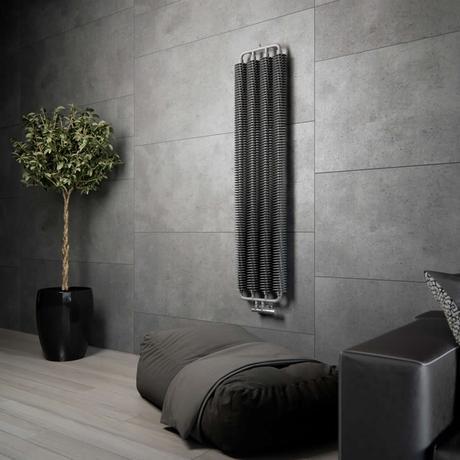 A Terma Ribbon radiator on a wall in grey