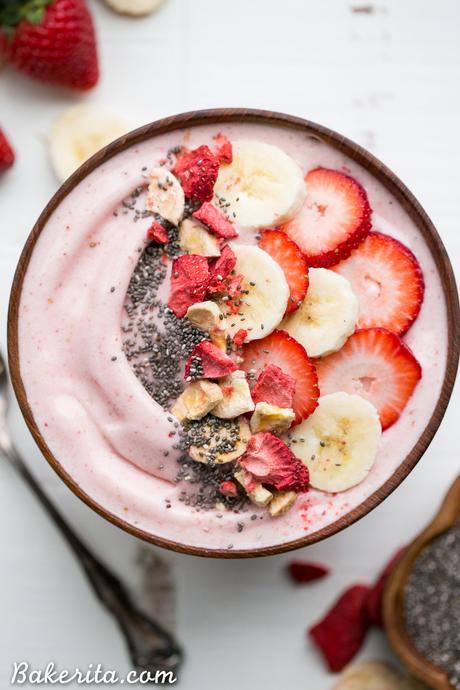 This easy Strawberry Banana Smoothie Bowl is a simple and sweet treat! It's a healthy Paleo + vegan breakfast or snack made with only a few ingredients, and you can add whichever toppings your heart desires to customize to your tastes.