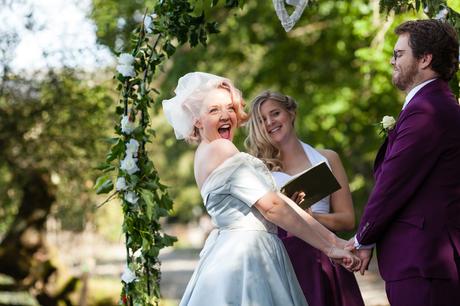 Bride excited during vows Derwentwater Independent Hostel Wedding