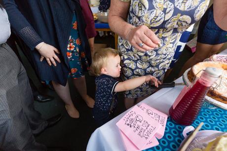 Cheeky baby grabs knife Derwentwater Independent Hostel Wedding