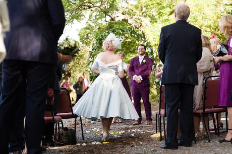 Groom watches as bride walks up aisle Derwentwater Independent Hostel Wedding