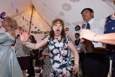 Funny faces during dancing at Derwentwater Independent Hostel Wedding
