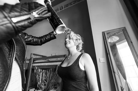 Bride having hairspray applied Derwentwater Independent Hostel Wedding