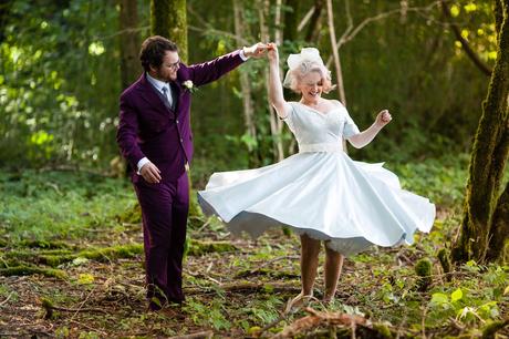 Bride in blue dress does a twirl Derwentwater Independent Hostel Wedding