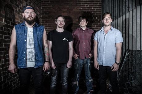 Image may contain: 4 people, people standing and beard