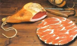 Prosciutto crudo, delizia italiana. Italian ham, a tasty food.”