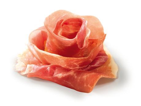 Prosciutto crudo, delizia italiana. Italian ham, a tasty food.”
